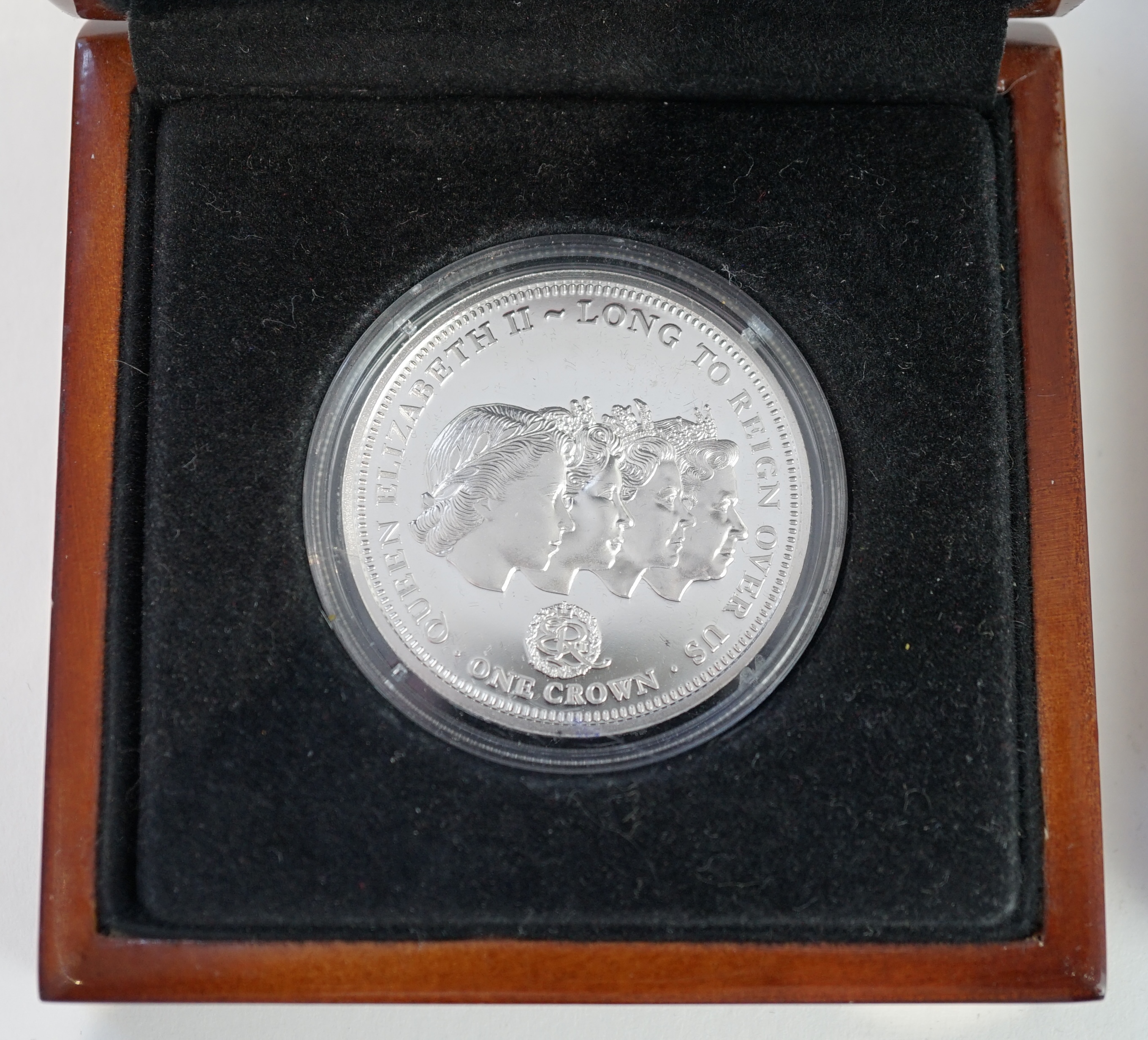 Commemorative coins, Elizabeth II, Bailiwick of Guernsey proof silver £5 Battle of the Somme 2016, a Tristan de Cunha proof silver one crown 2015, Churchill proof silver £20, 2015, cased with two other Churchill coins, a